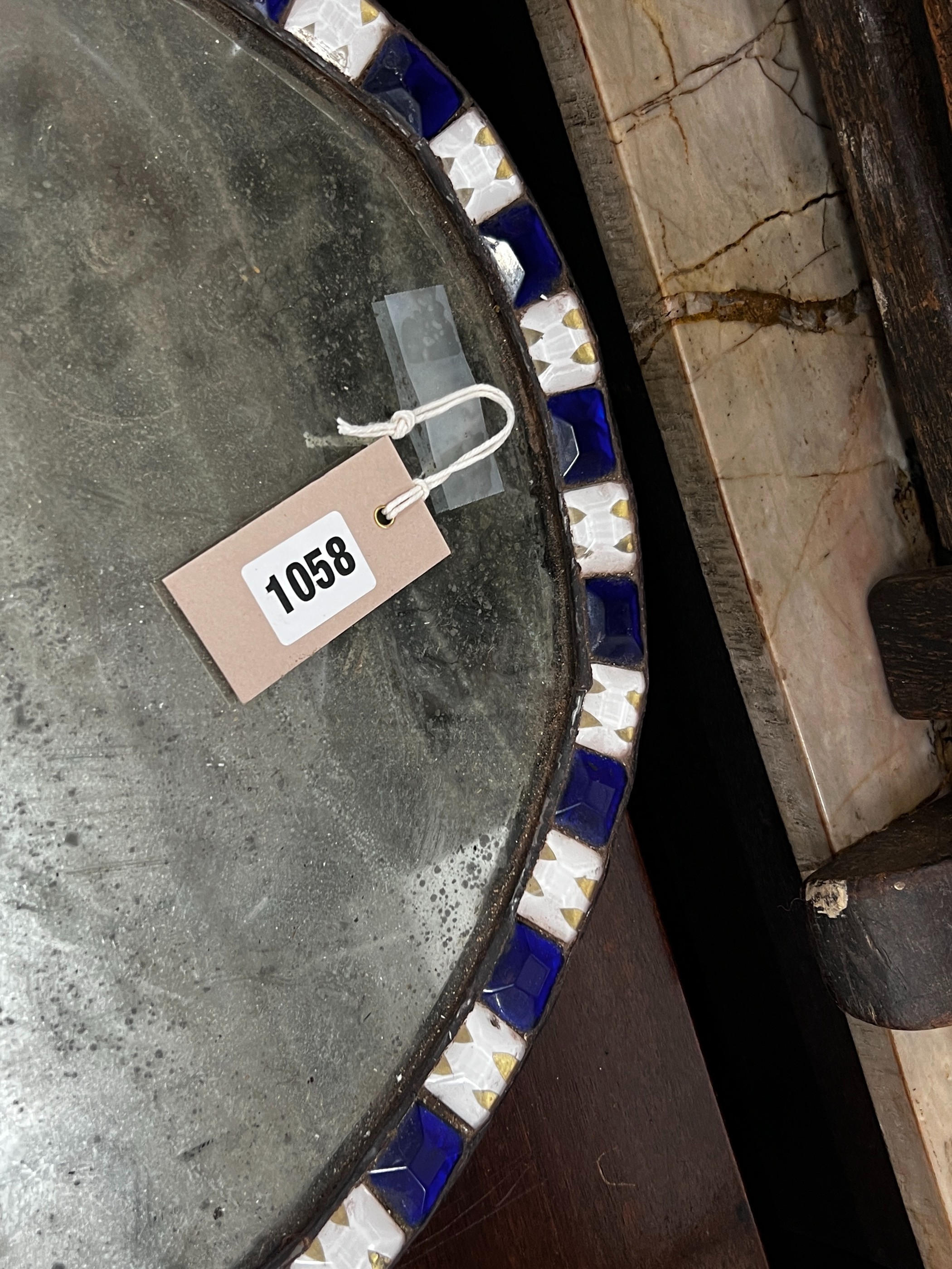 An oval Irish style wall mirror, width 41cm, height 51cm